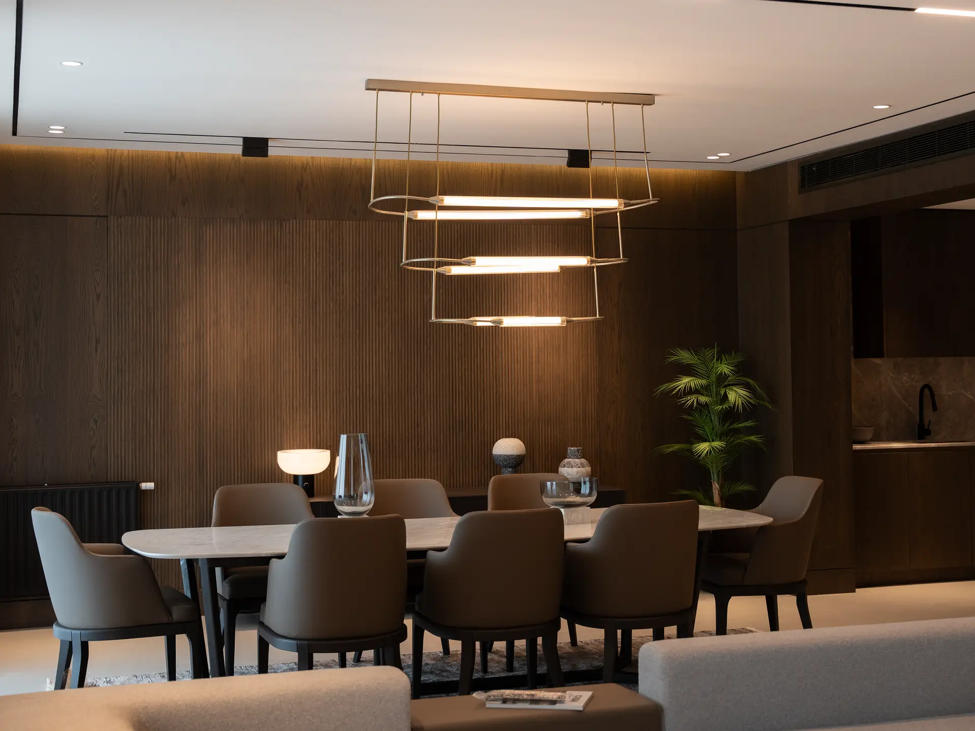 Luxury dining area with modern chandelier