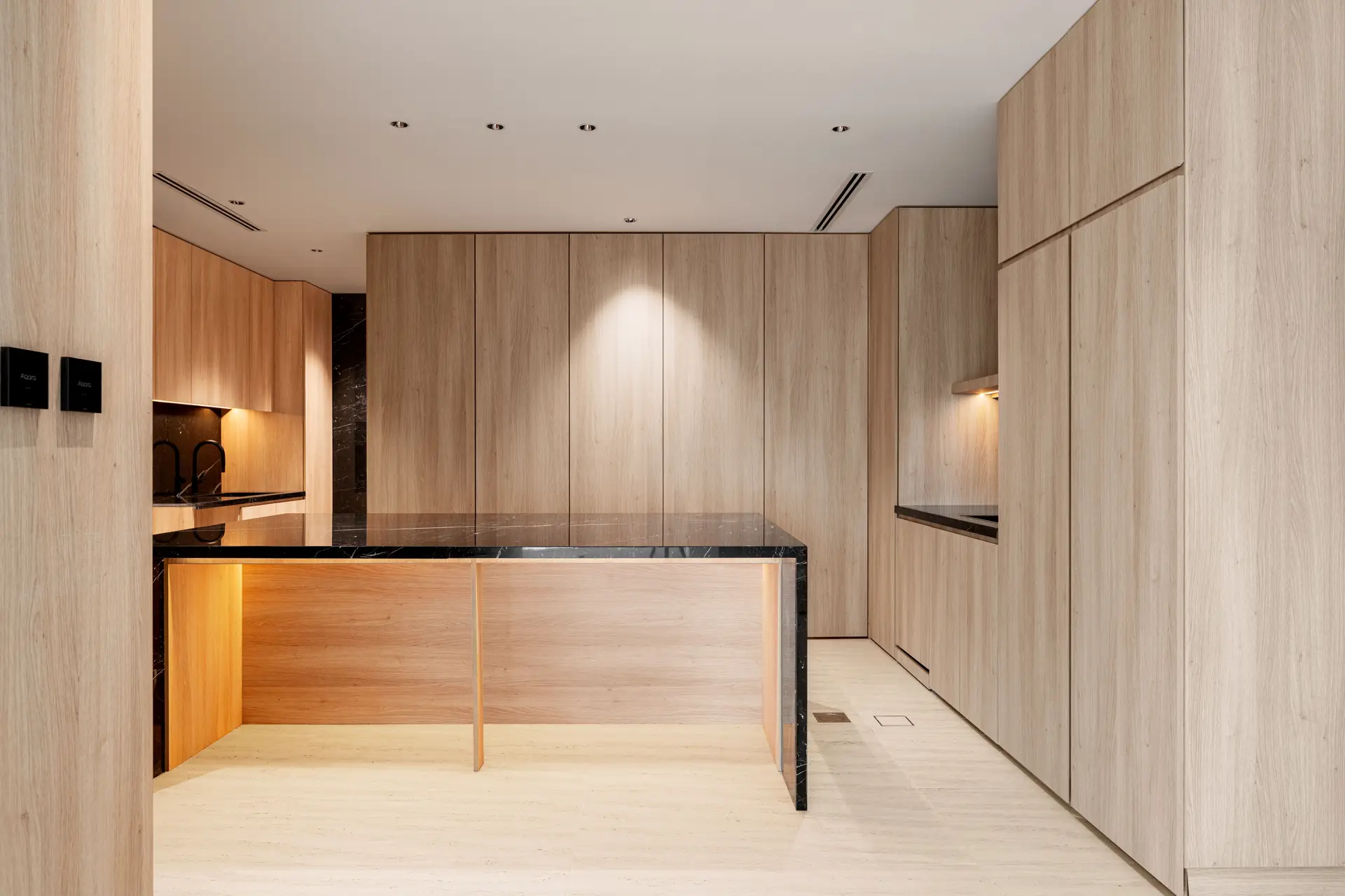 Sleek black marble kitchen island